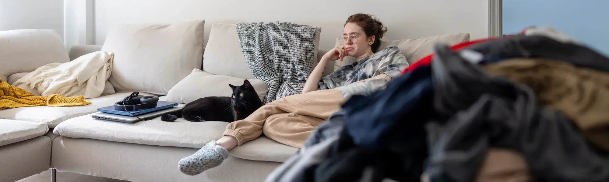 woman on couch with cat